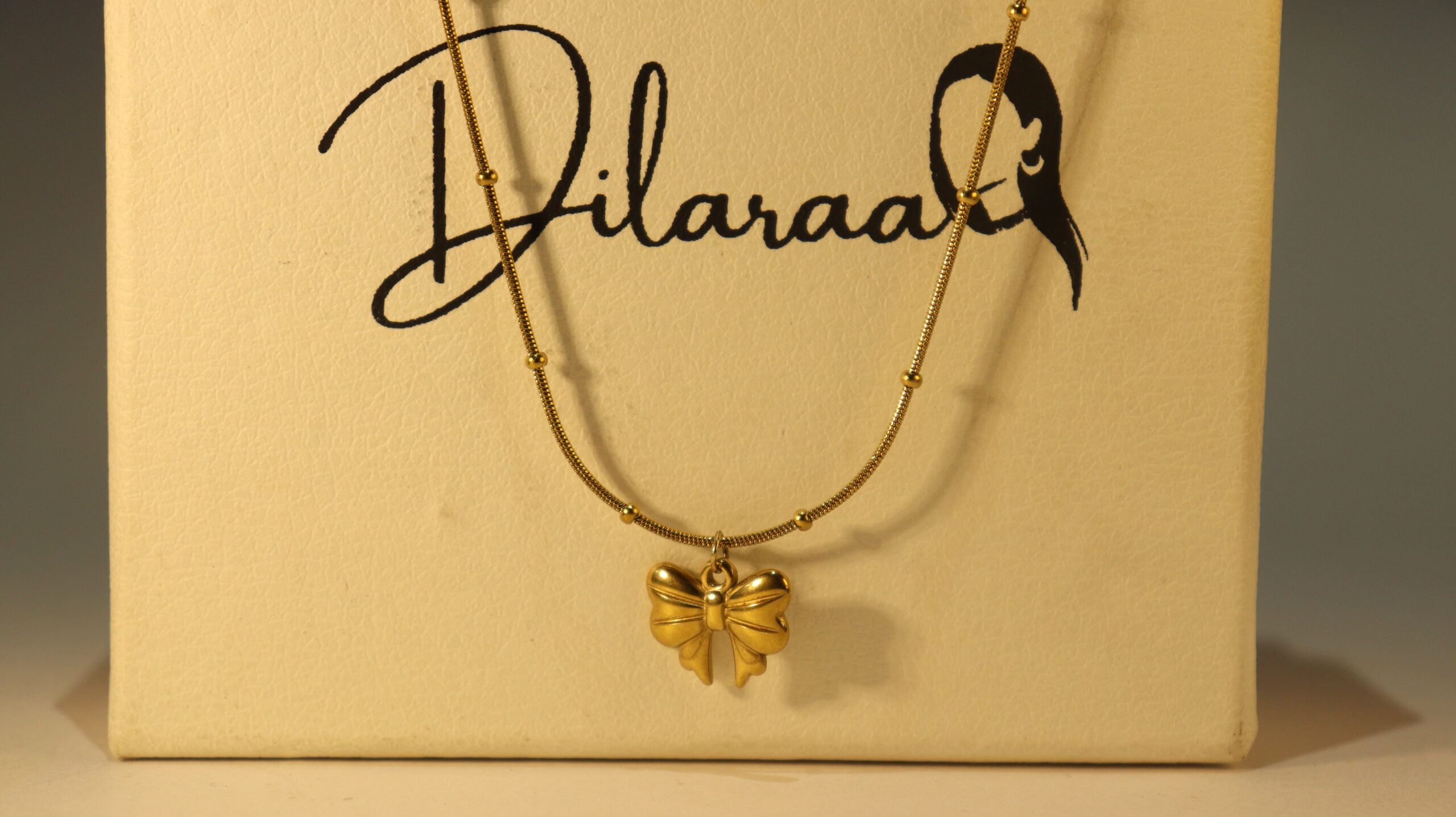 18k-gold-plated-bead-bow-necklace